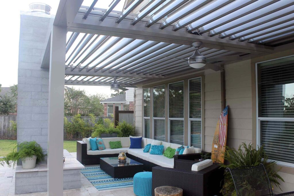 Backyard enhanced with lattice arbor creating defined outdoor living area by 21st Century Sunrooms Houston TX
