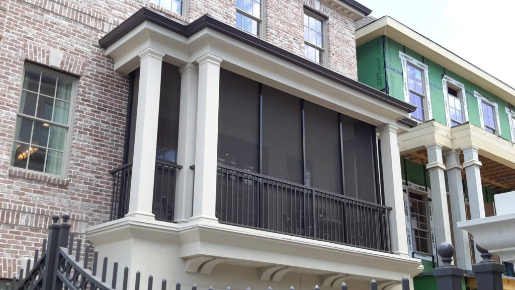 Balcony screen enclosure with aluminum framing creating protected outdoor space by 21st Century Sunrooms Houston TX