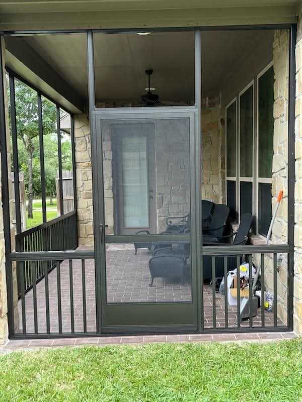 Bronze screen enclosure featuring custom design and warm metallic finish by 21st Century Sunrooms Houston TX