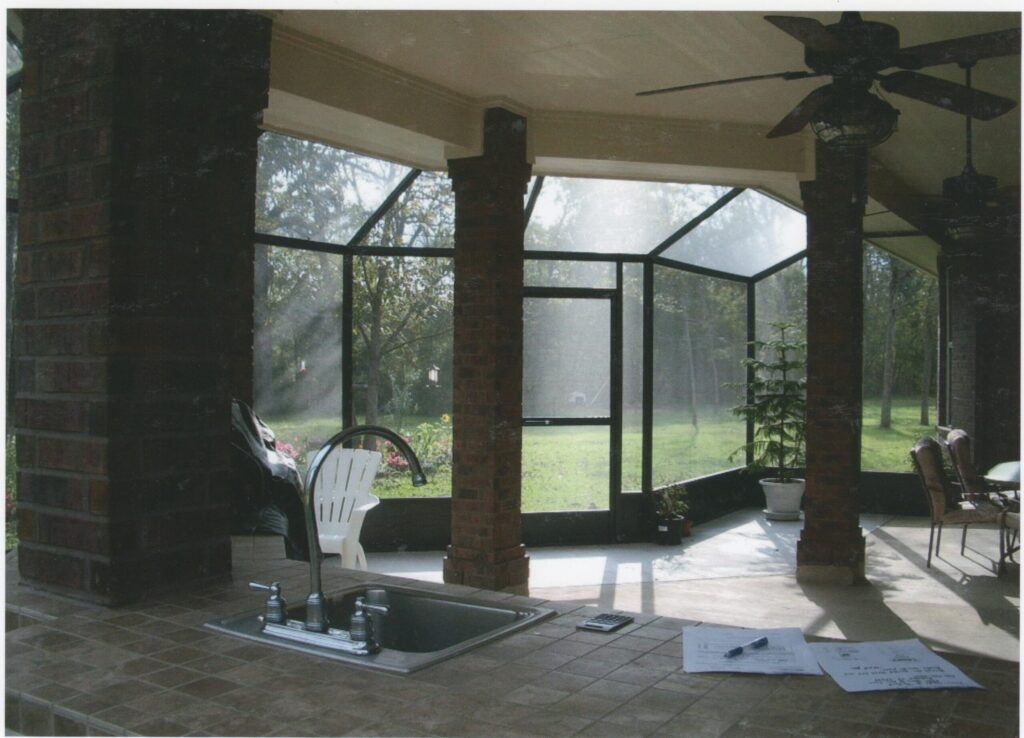 Custom patio enclosures with aluminum framing creating protected outdoor spaces in Montgomery Texas by 21st Century Sunrooms