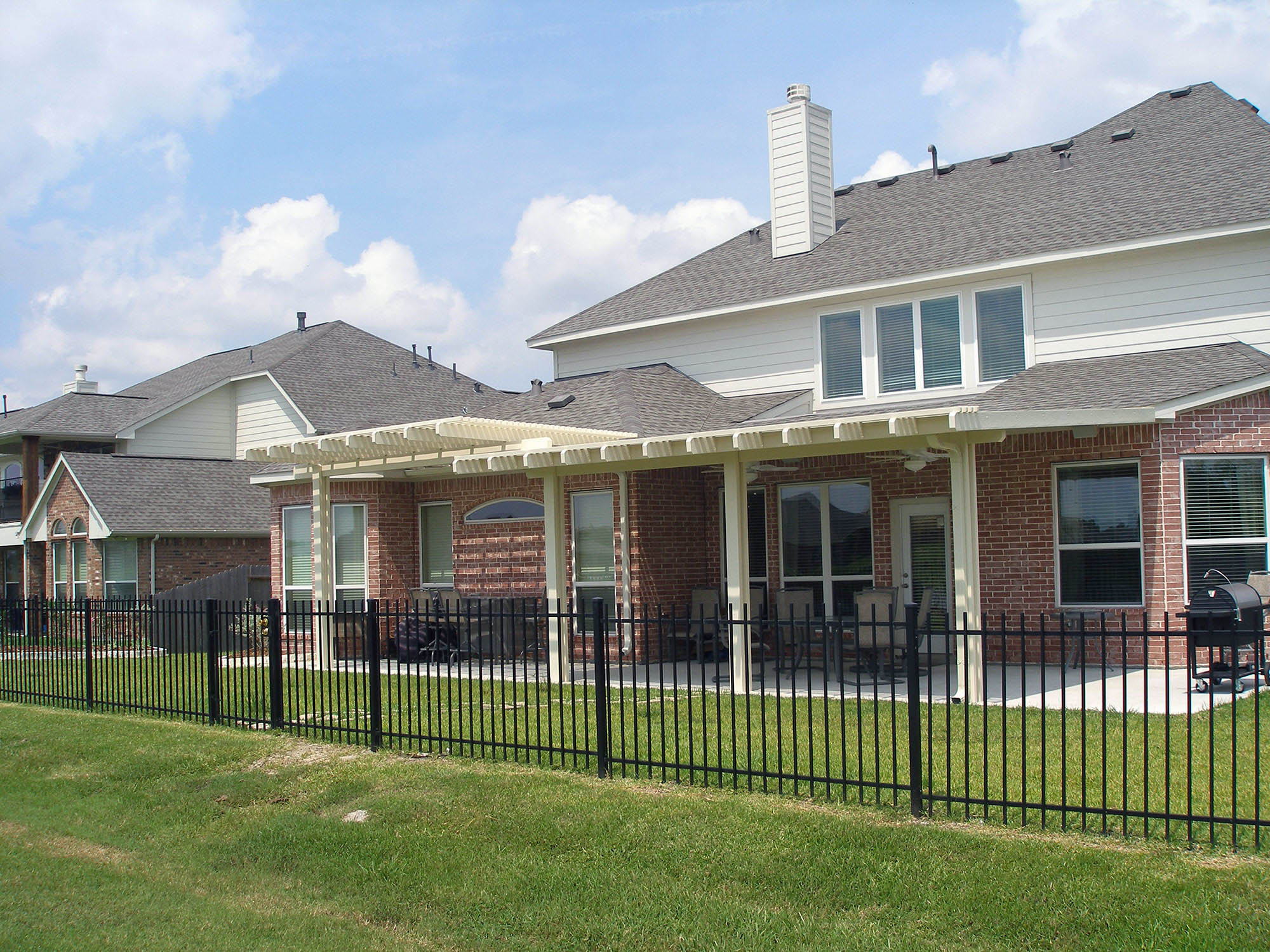 Custom pergola with elegant design enhancing backyard space by 21st Century Sunrooms Houston TX