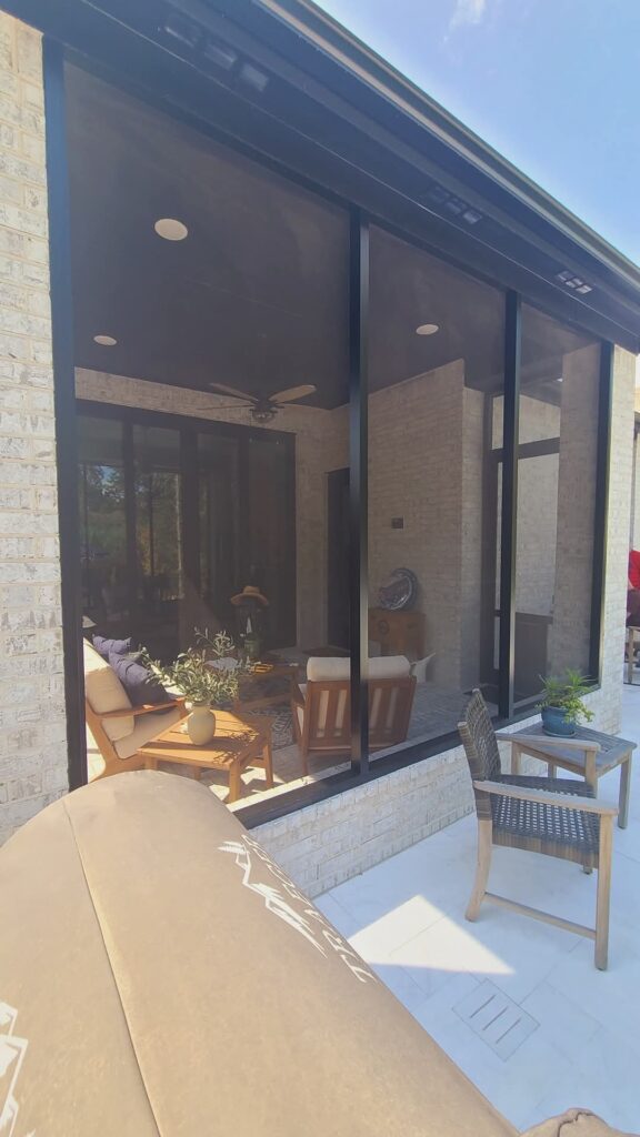 Custom screen enclosure with durable aluminum framing creating protected space in Montgomery Texas by 21st Century Sunrooms