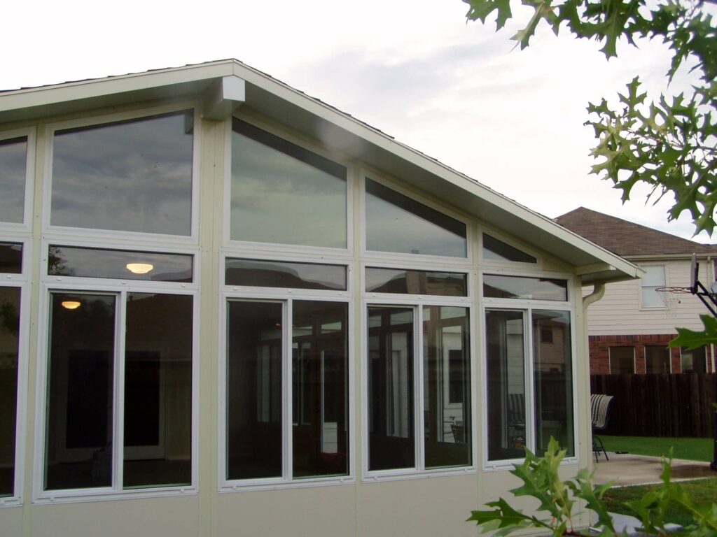 Custom sunroom with tailored design and aluminum construction by 21st Century Sunrooms Houston TX