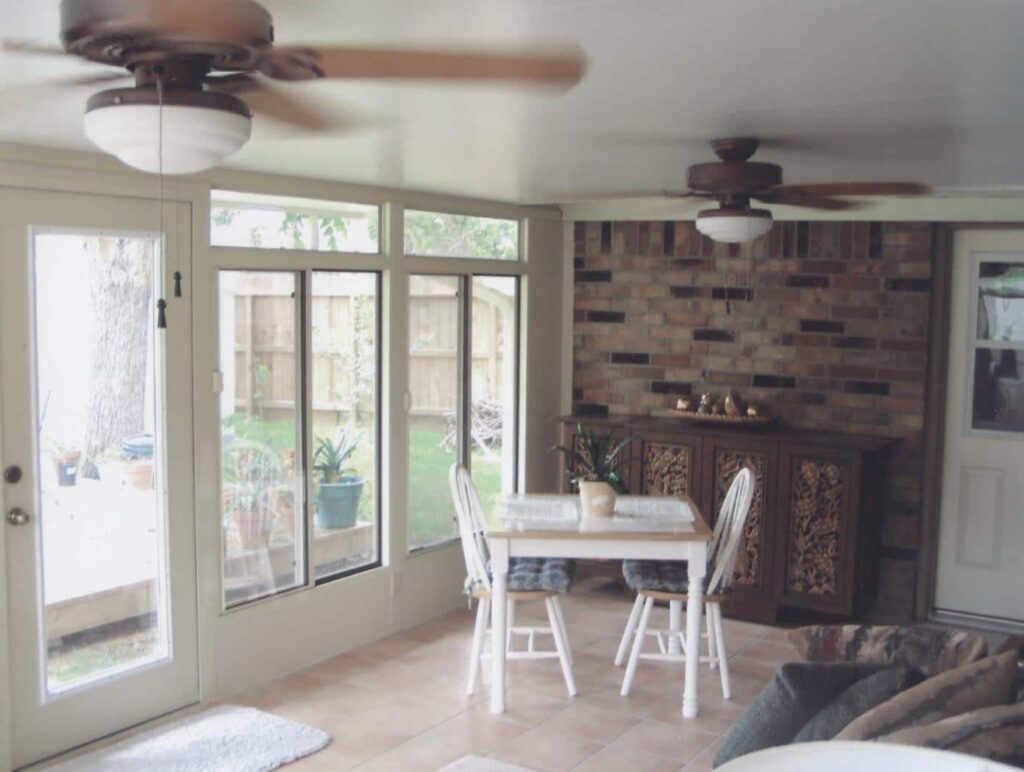 Custom sunrooms with aluminum frames and glass panels adding living space to Houston homes by 21st Century Sunrooms