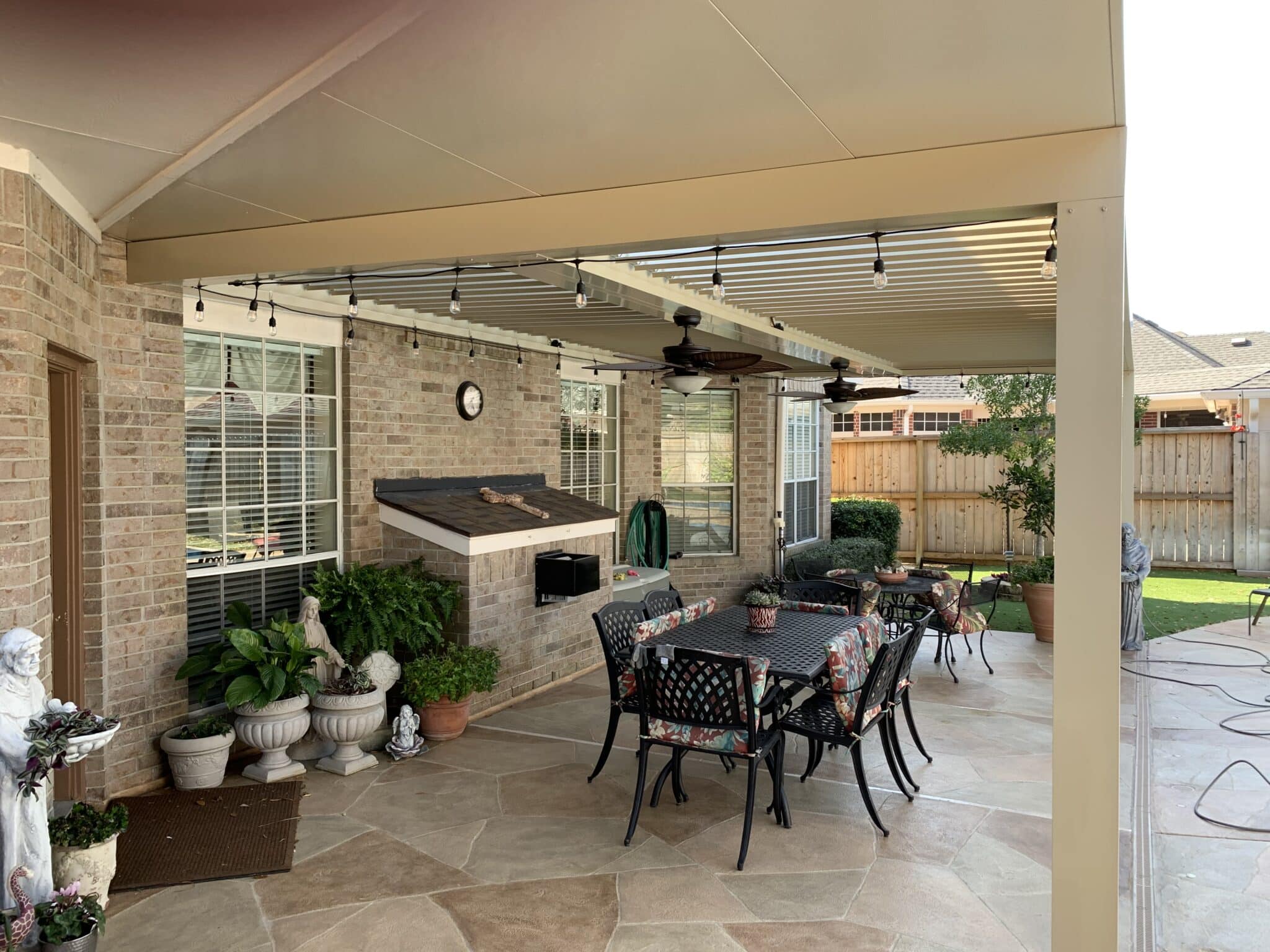 Equinox louvered roof featuring solid angle panel for angled coverage with adjustable louver sections by 21st Century Sunrooms Houston TX