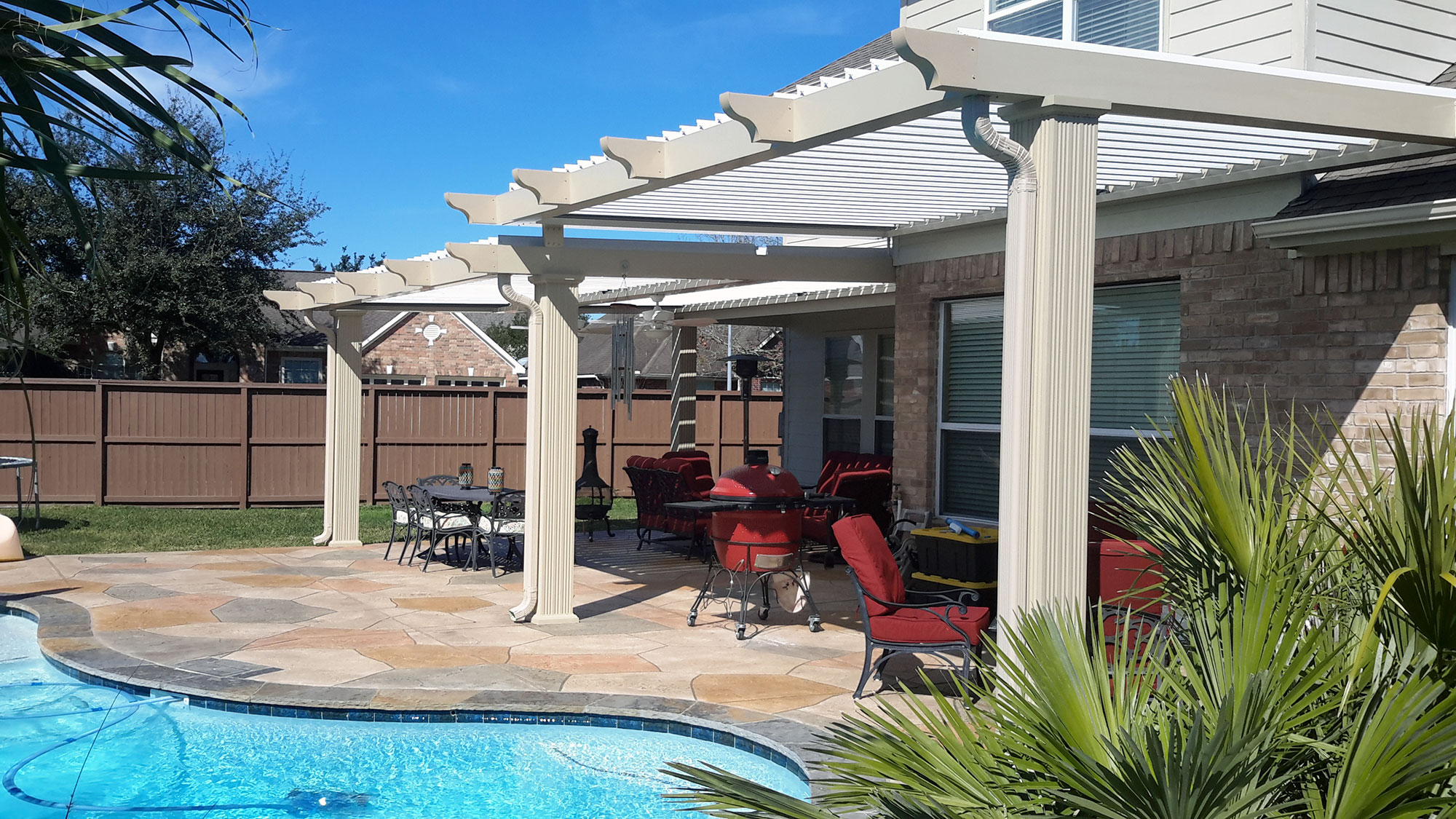 Equinox louvered roof elevating outdoor space with adjustable comfort by 21st Century Sunrooms Houston TX