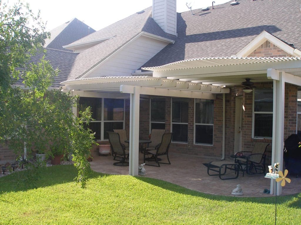 Multi-level lattice arbor pergola with tiered design creating architectural interest by 21st Century Sunrooms Houston TX