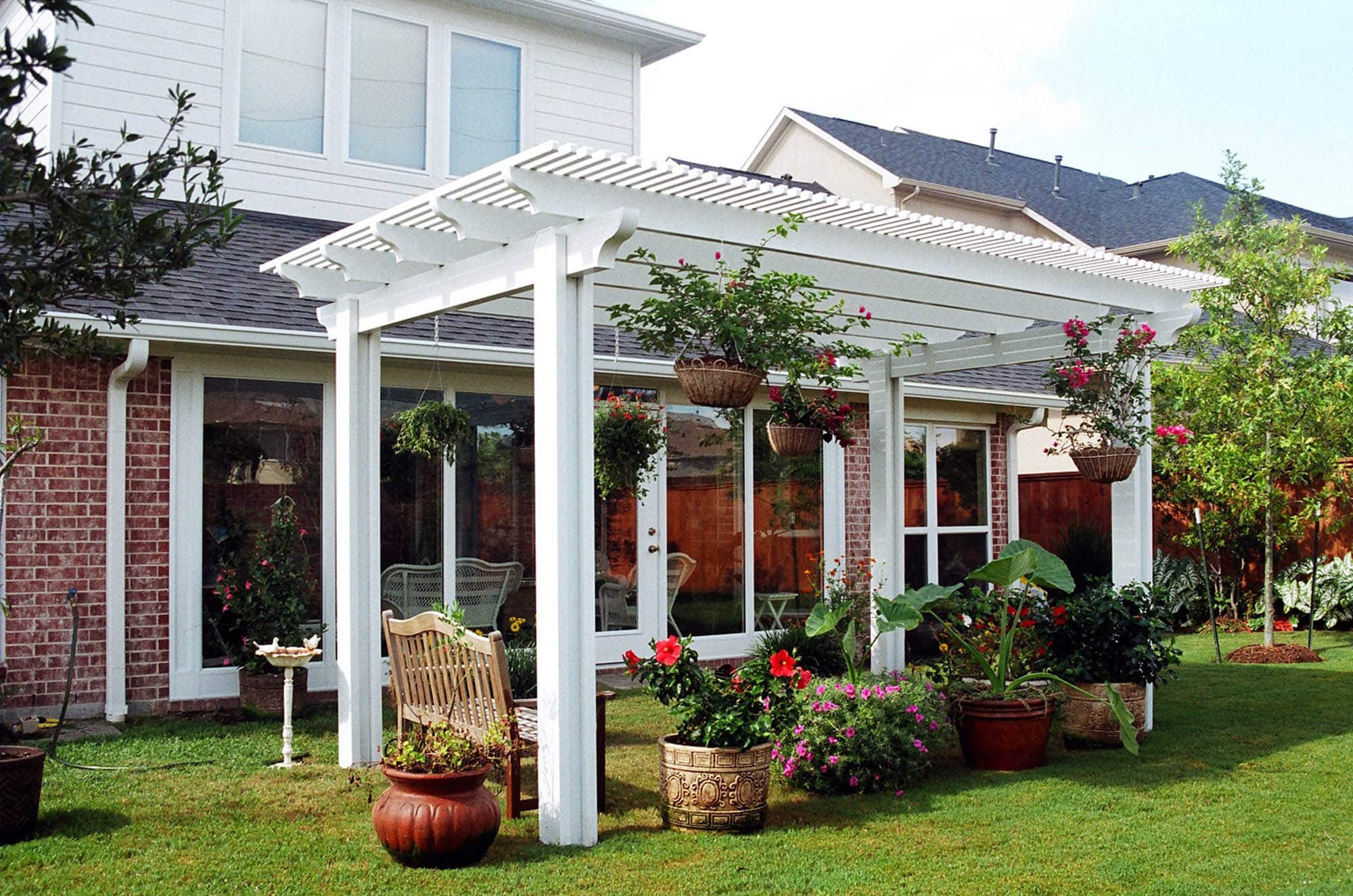 Pergola design creating defined outdoor living area with filtered shade by 21st Century Sunrooms Houston TX
