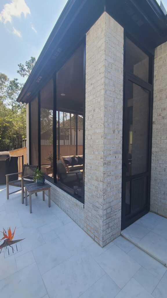 Screen enclosure creating protected outdoor living area in Montgomery TX by 21st Century Sunrooms
