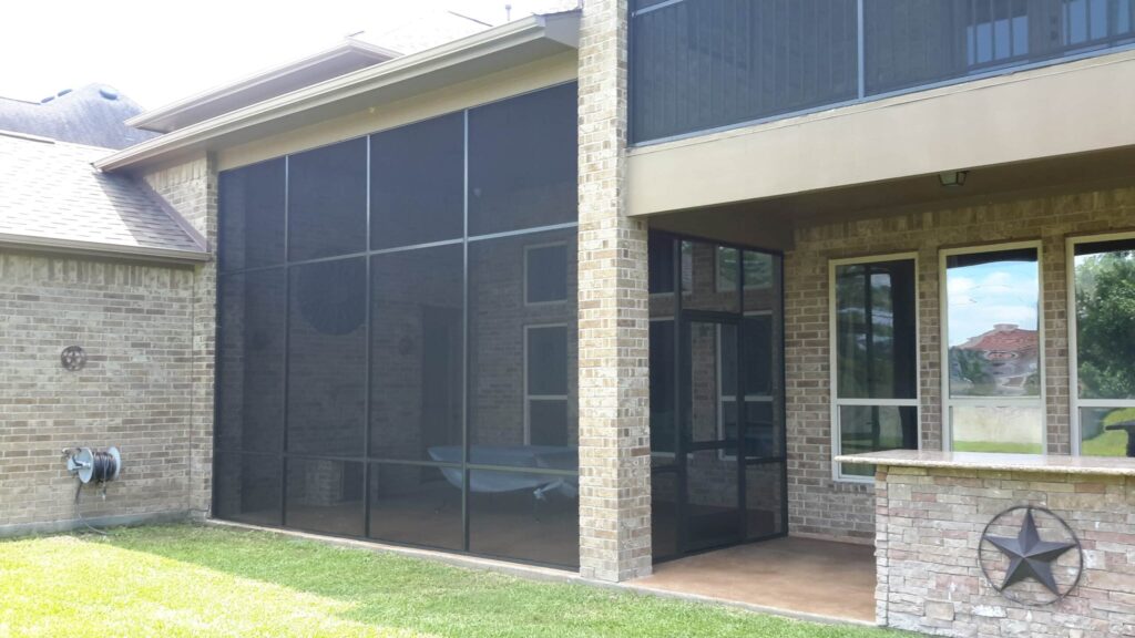 Professional screen enclosure installation with aluminum frame by 21st Century Sunrooms Houston TX
