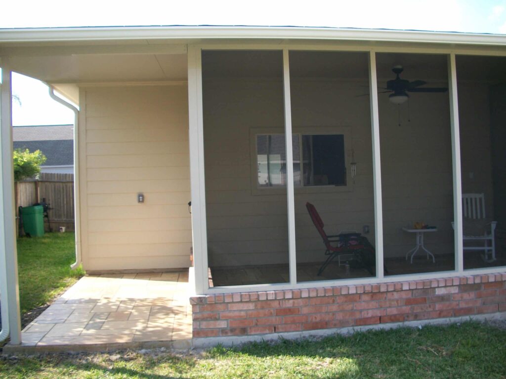 Completed screen room enclosure project with aluminum frame and mesh screening by 21st Century Sunrooms Houston TX