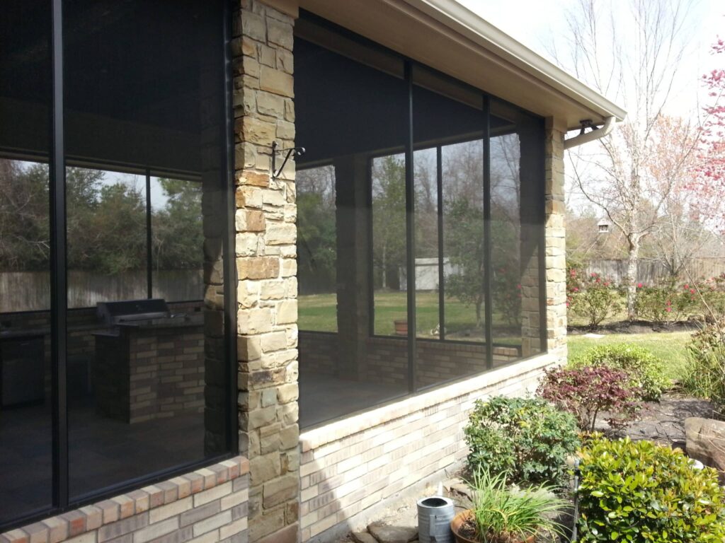 Screen room installation with aluminum frame and mesh screening by 21st Century Sunrooms Houston TX