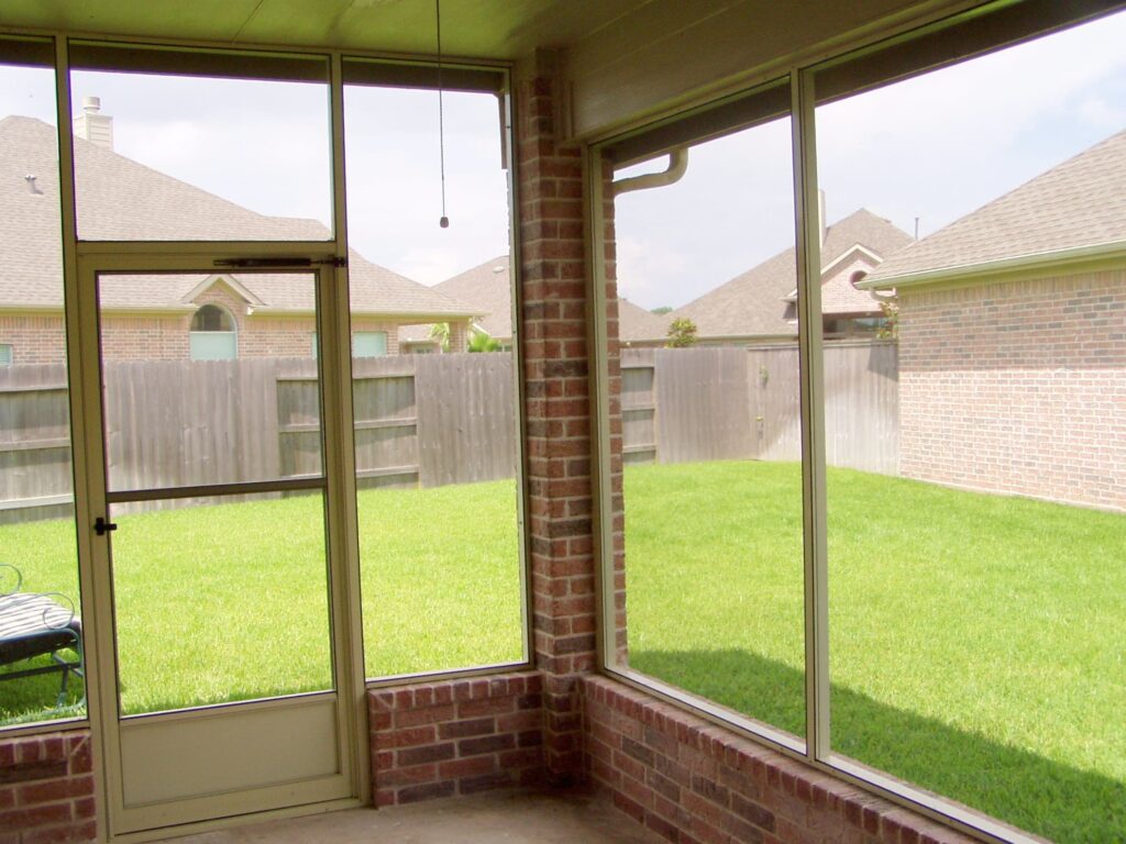 Screen rooms providing comfortable bug-free outdoor living with aluminum construction by 21st Century Sunrooms Houston TX