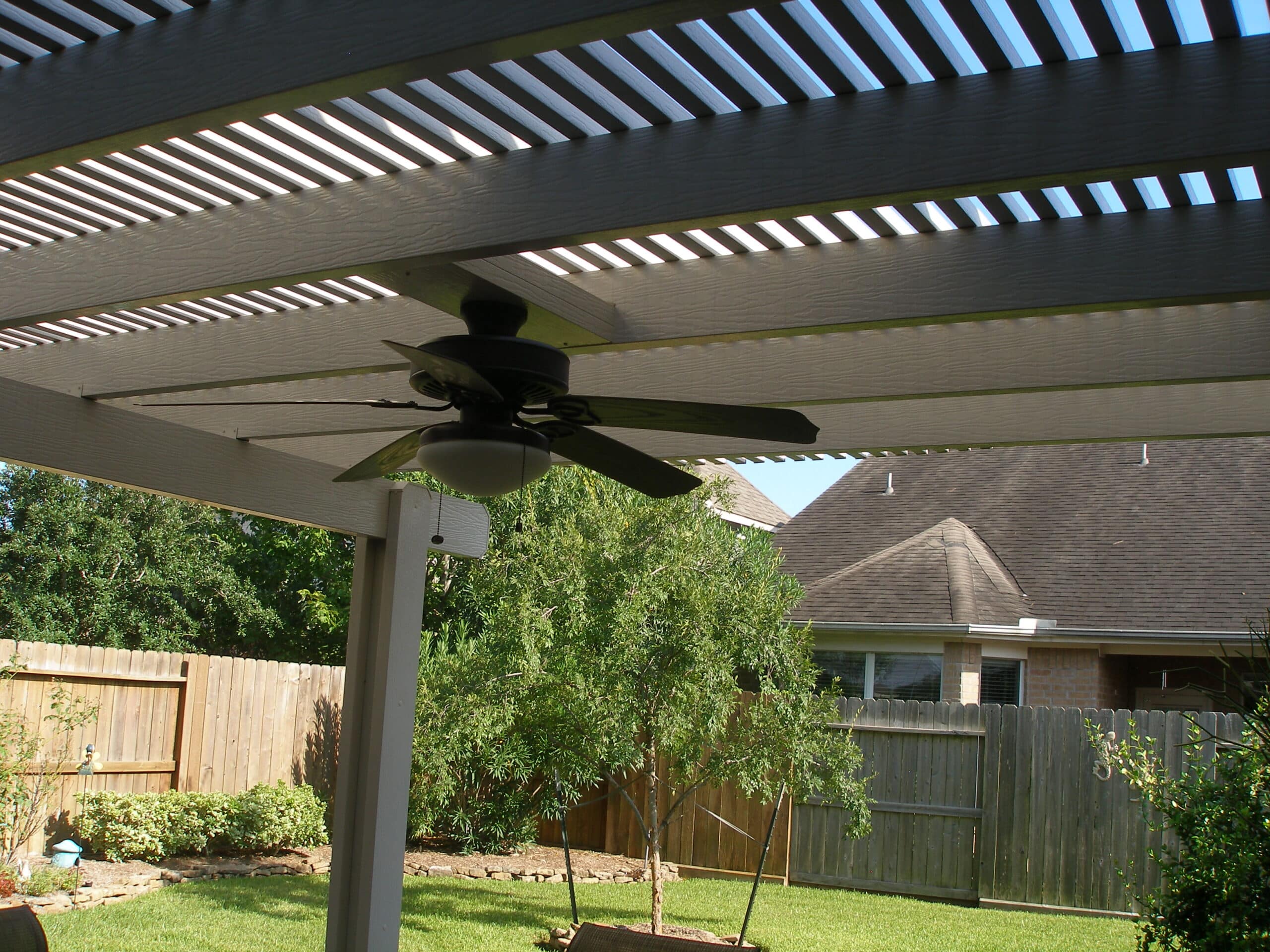 Two level lattice structure with tiered design on gable house by 21st Century Sunrooms Houston TX