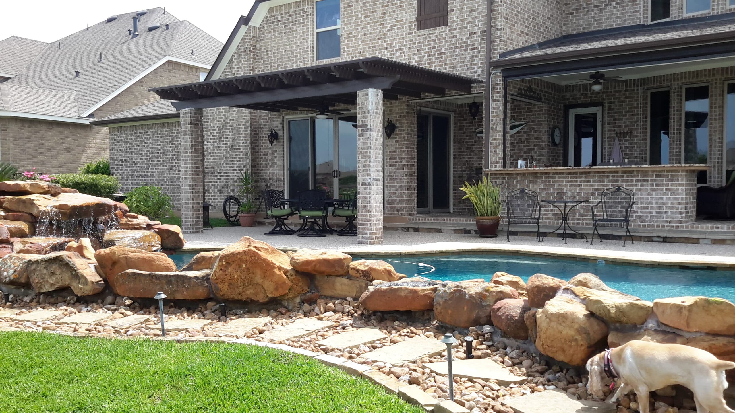 Ultra lattice pergola with Spanish brown finish providing decorative shade by 21st Century Sunrooms Houston TX